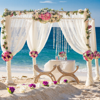 beach wedding set up, tropical outdoor wedding reception, beautiful cabana, wedding arch